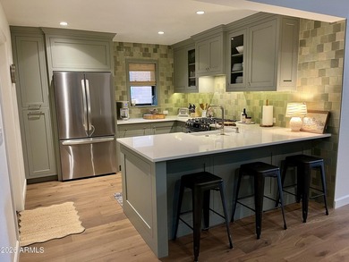 Discover this stunningly remodeled home in the highly - photo 3