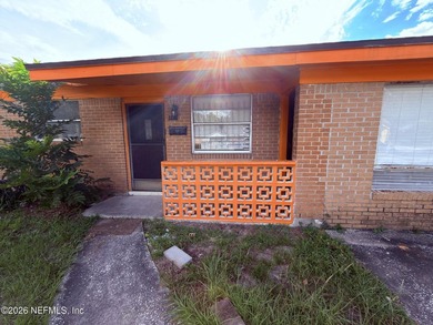 This Jacksonville home is all brick with great bones. 3 bedroom - photo 3