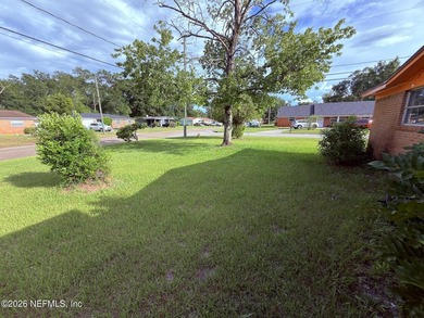 This Jacksonville home is all brick with great bones. 3 bedroom - photo 4