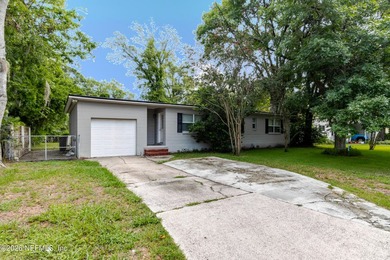 Welcome home to 6501 Mitford Rd! This charming 3-bedroom, 2-bath - photo 3