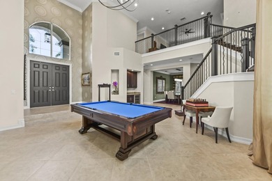 Welcome to this exceptional two-story estate in the exclusive - photo 9