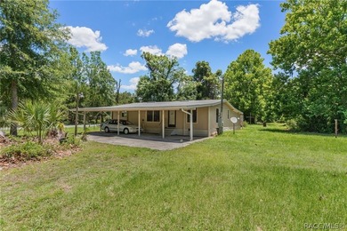 Discover the potential of this 2.14-acre corner lot property in - photo 2