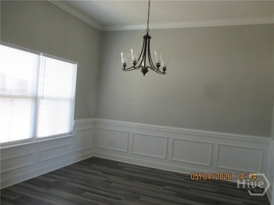 This open floor plan may be just what you want! Being sold AS-IS - photo 2
