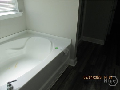 This open floor plan may be just what you want! Being sold AS-IS - photo 6