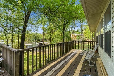This Lake Hamilton home is located in a Quiet Cove right off the - photo 23
