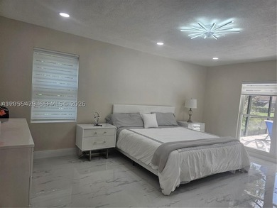 Modern heated pool and spa 4/2 Single-story residence in PGA - photo 4