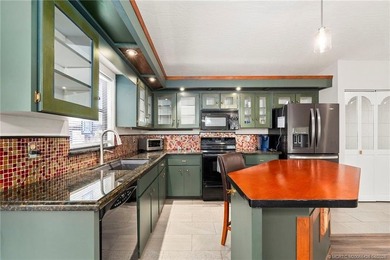 Country Cutie! Lovely 3 bed 2 bath lake front home situated on - photo 7