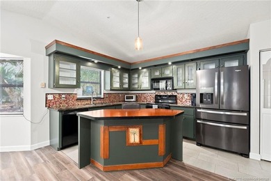 Country Cutie! Lovely 3 bed 2 bath lake front home situated on - photo 8