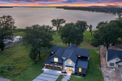 This modern farmhouse mini mansion on the water is truly a - photo 1