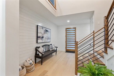 This modern farmhouse mini mansion on the water is truly a - photo 3