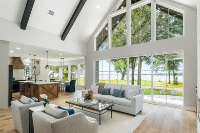 This modern farmhouse mini mansion on the water is truly a - photo 4