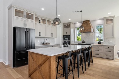 This modern farmhouse mini mansion on the water is truly a - photo 7