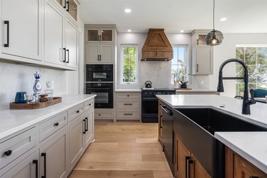 This modern farmhouse mini mansion on the water is truly a - photo 9