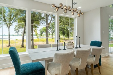 This modern farmhouse mini mansion on the water is truly a - photo 10