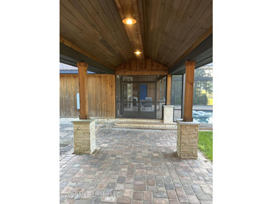 This gorgeous 3,320 sq ft remodeled cedar home sits on nearly an - photo 5
