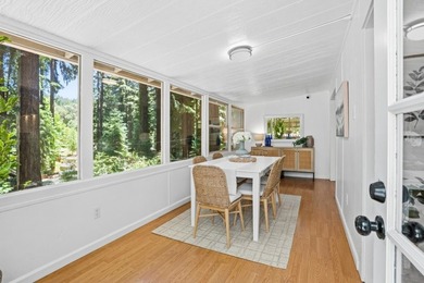 Nestled beneath a canopy of majestic redwood trees on a spacious - photo 5