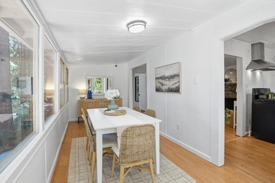 Nestled beneath a canopy of majestic redwood trees on a spacious - photo 9