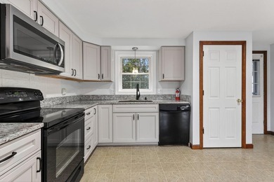 Welcome to easy, low-maintenance living in the heart of - photo 11