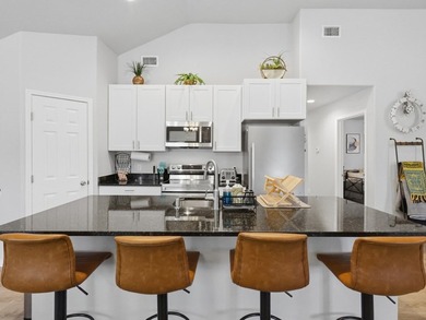 Built in 2021, this 3-bedroom, 2-bath coastal cottage sits on - photo 10