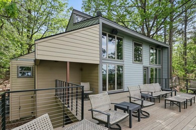 Set along the shores of Lake Greeson, this exceptional lakefront - photo 1