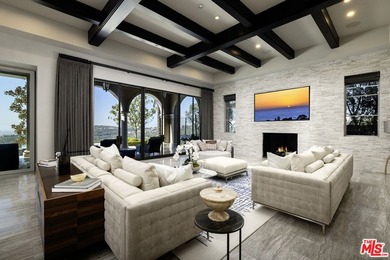 Perched at the pinnacle of Crystal Cove on a rare, single-loaded