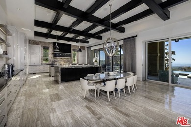 Perched at the pinnacle of Crystal Cove on a rare, single-loaded