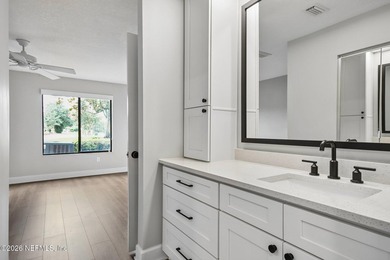 This beautifully renovated 2-bedroom, 2-bath ground-floor condo - photo 9