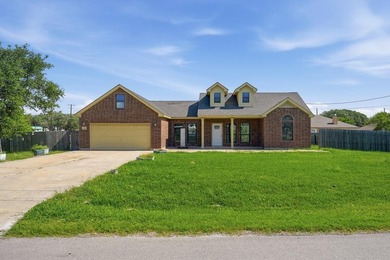 Discover this beautiful Fulton, Texas home with 3 spacious - photo 1