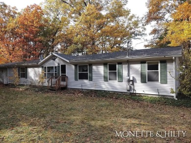 (private lake, pond, creek) Home Sale Pending in Twin Lake Michigan