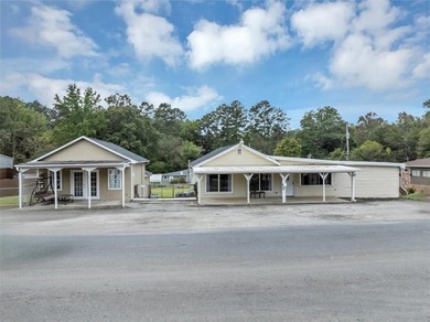Located in the heart of downtown Acworth, this unique and - photo 1