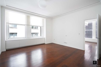 Welcome home to this glamorous corner One Bedroom apartment at - photo 11
