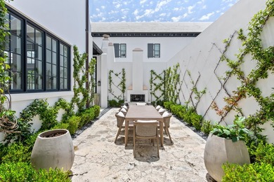 25 Moongate Court is one of the Khoury Vogt designed gems of - photo 16