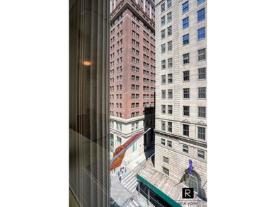 Welcome home to this glamorous corner One Bedroom apartment at - photo 17