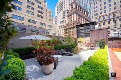 Welcome home to this glamorous corner One Bedroom apartment at - photo 18