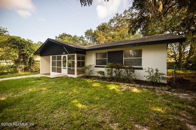 Cute house sits up high from street. Large screened porch, 1 car - photo 4