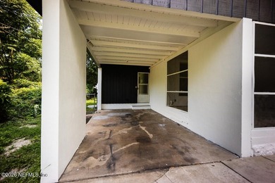 Cute house sits up high from street. Large screened porch, 1 car - photo 5
