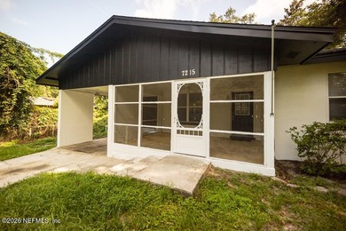Cute house sits up high from street. Large screened porch, 1 car - photo 6