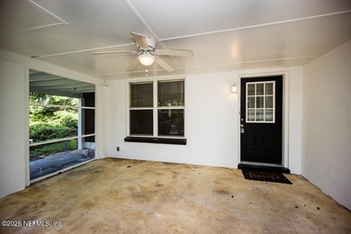 Cute house sits up high from street. Large screened porch, 1 car - photo 7