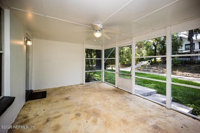 Cute house sits up high from street. Large screened porch, 1 car - photo 8