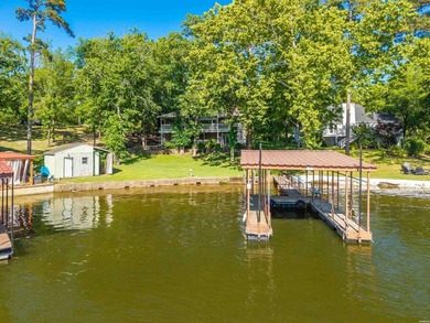 Tucked away on a large 1-acre waterfront lot, this fully - photo 2