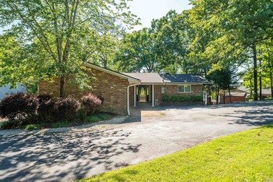 Tucked away on a large 1-acre waterfront lot, this fully - photo 4