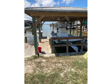 Build your dream home on this canal front lot and a half. Water - photo 3