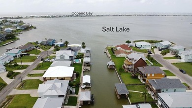 Build your dream home on this canal front lot and a half. Water - photo 6