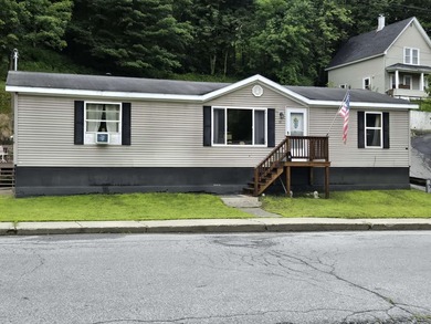 Check out this fully remodeled 3-bed, 2-bath home with a heated - photo 1