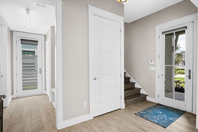 Effortless waterfront living begins here-this fully furnished - photo 6