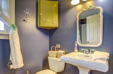 TURN KEY & FULLY FURNISHED. Beautiful custom coastal cottage