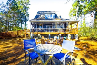 TURN KEY & FULLY FURNISHED. Beautiful custom coastal cottage