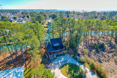 TURN KEY & FULLY FURNISHED. Beautiful custom coastal cottage