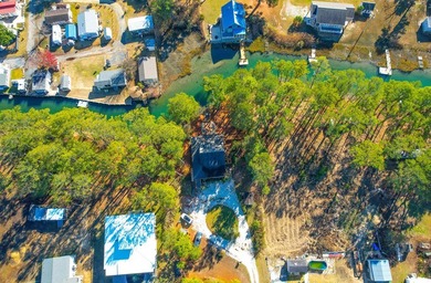 TURN KEY & FULLY FURNISHED. Beautiful custom coastal cottage