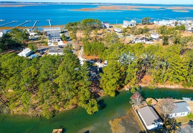 TURN KEY & FULLY FURNISHED. Beautiful custom coastal cottage